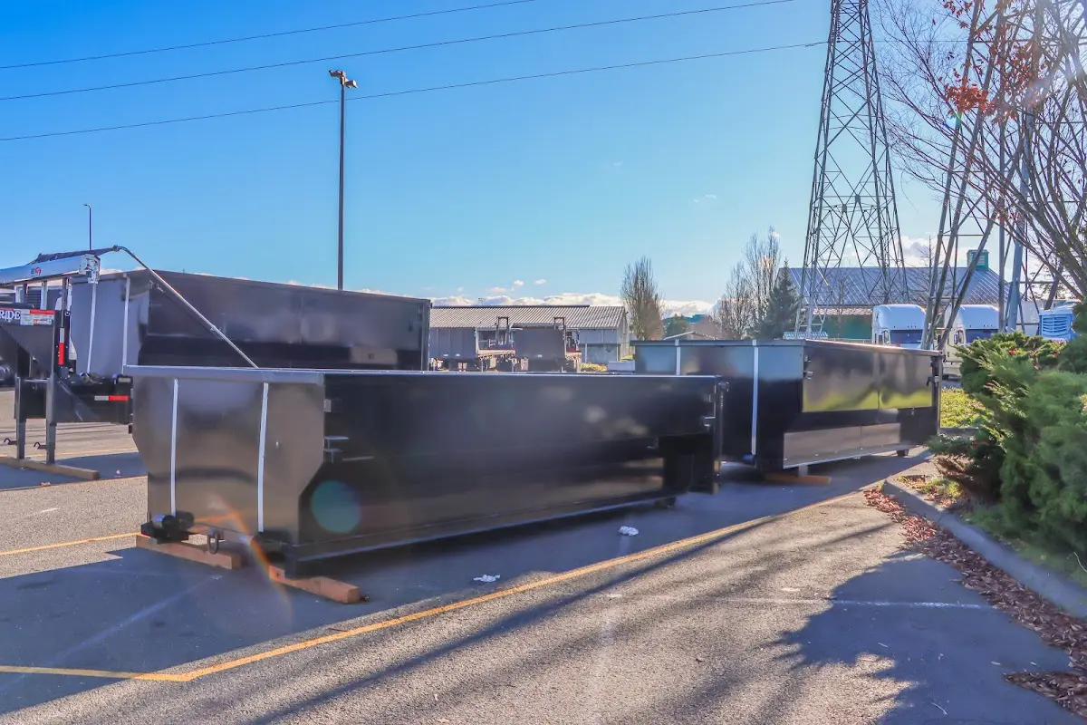 Roll-off dumpster ready for waste disposal at job site for Construction Dumpster Rental in Otis Orchards-East Farms
